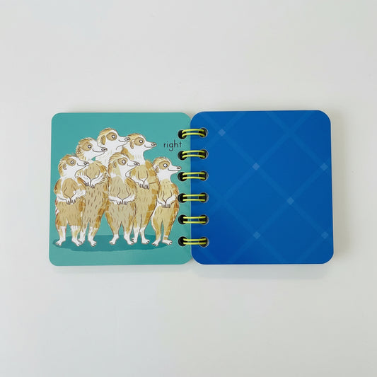 Inside cover of notebook with meercats looking right