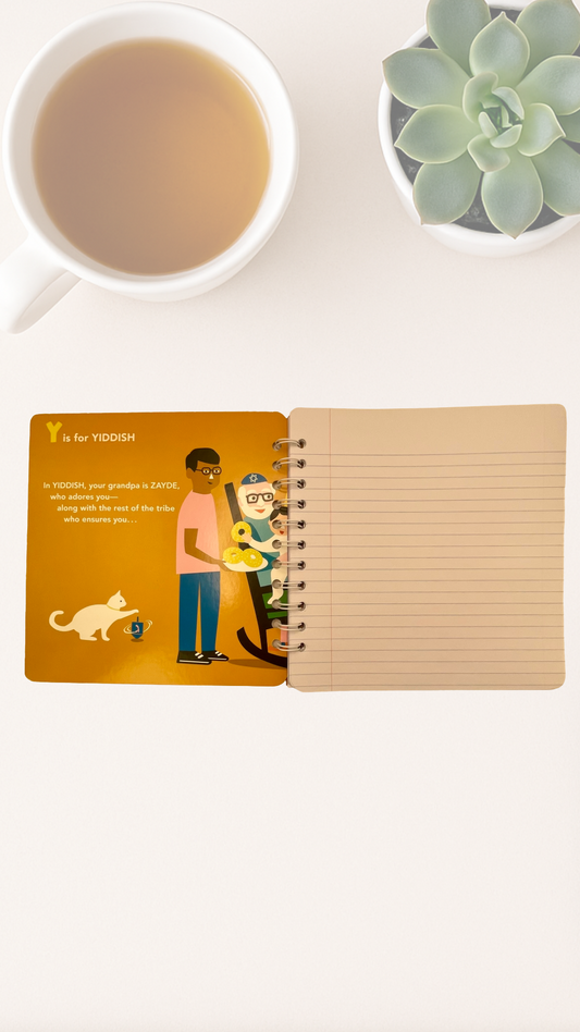 Notebook with a colorful inside cover illustration that says Y is for Yiddish