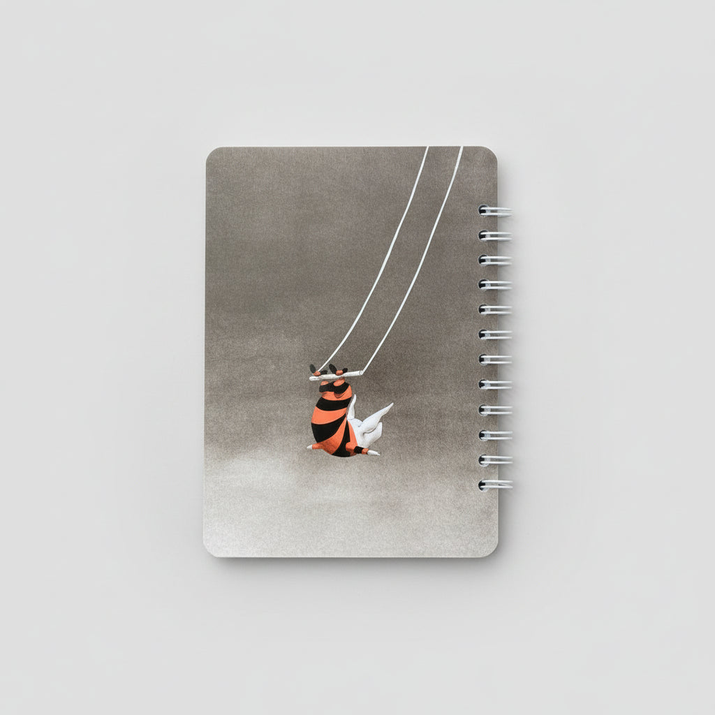 Olivia dangling from the trapeze