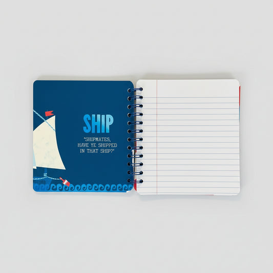 Notebook with blue cover and white pages on a brown background