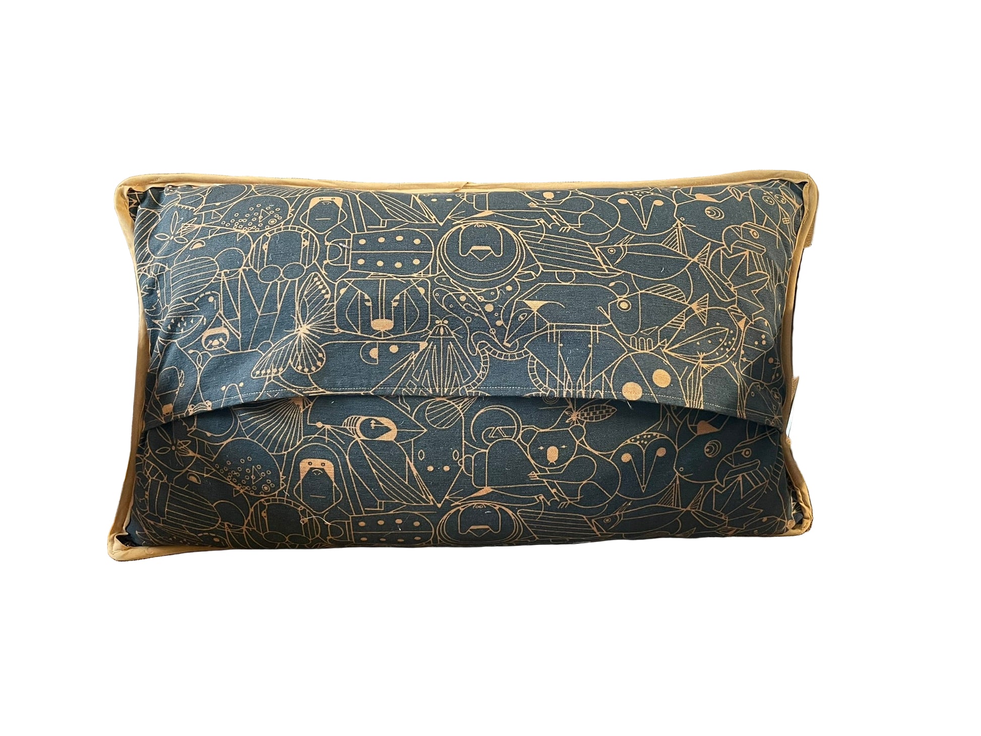 Decorative pillow with animal pattern on a brown chair