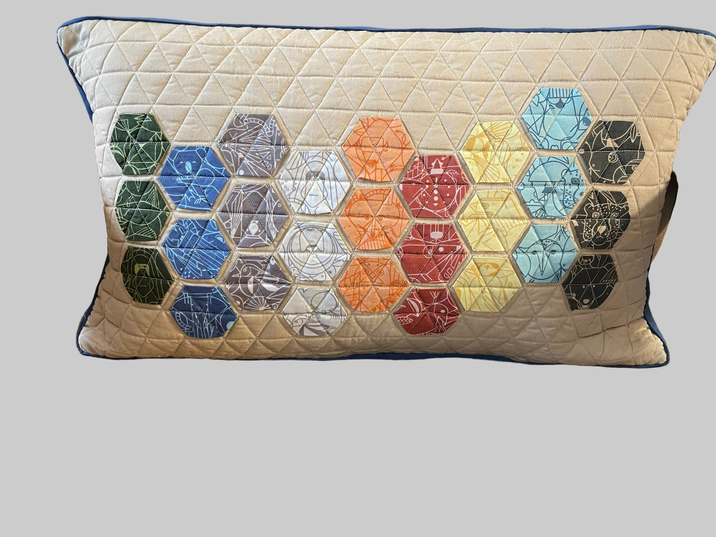 Quilted throw pillow hexagonal pattern with Charley Harper Endpapers fabric
