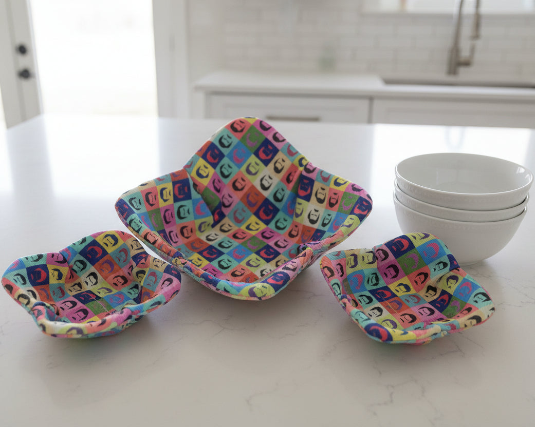 Colorful patterned with Ron Swanson-style fabric bowl cozies