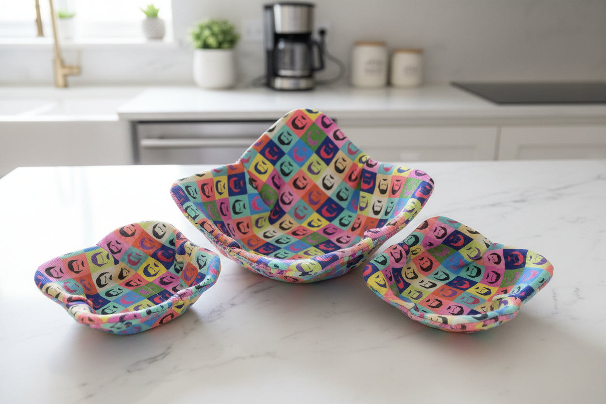 Ron Swanson fabric reversible bowl cozies on a kitchen countertop
