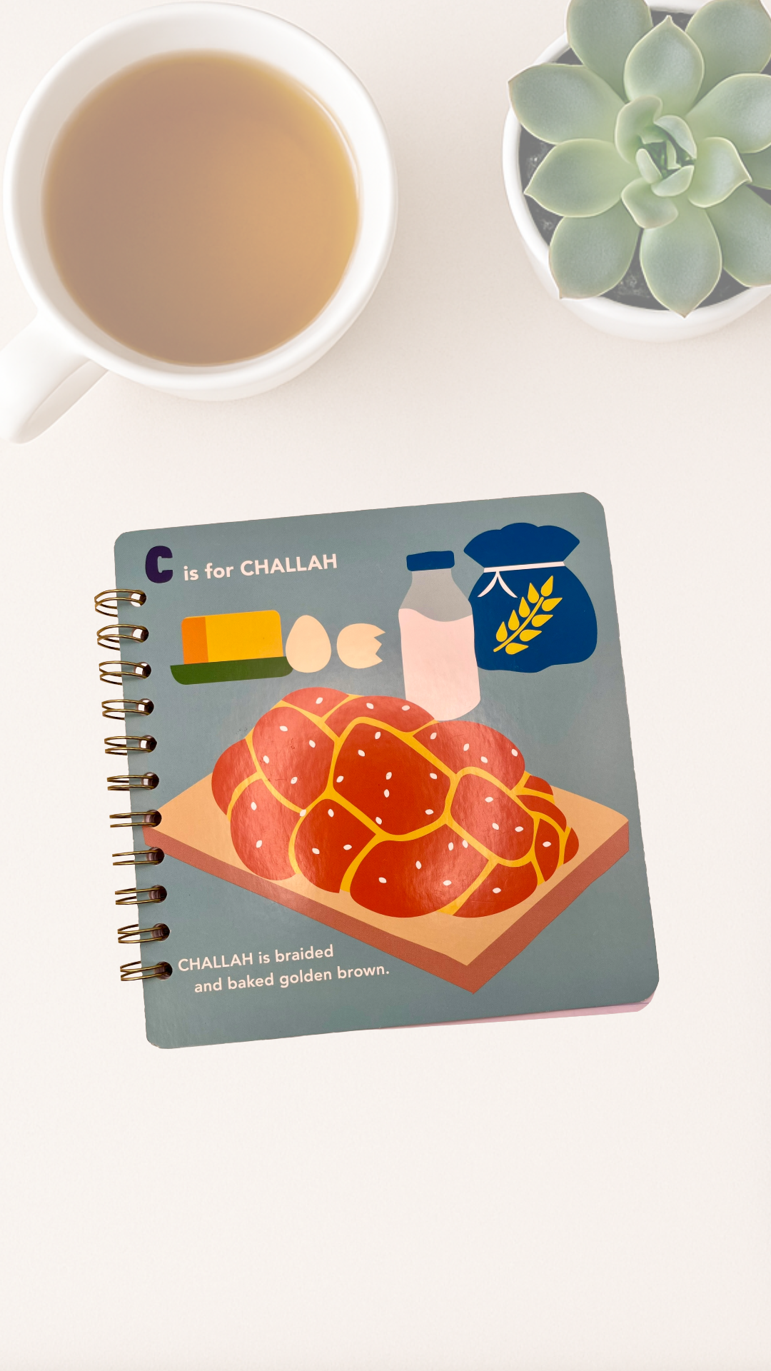 Notebook with an illustration challah bread on front cover 