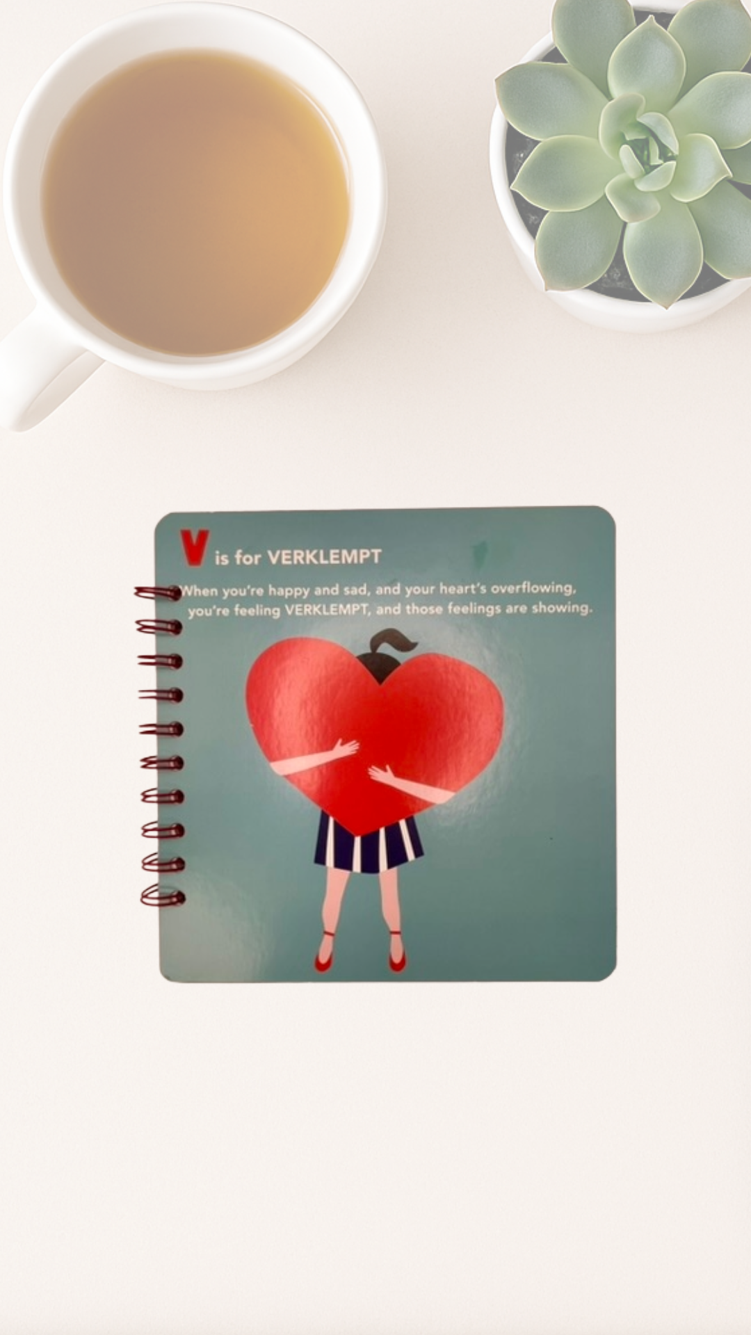 Notebook with a heart design that says V is for Verklempt