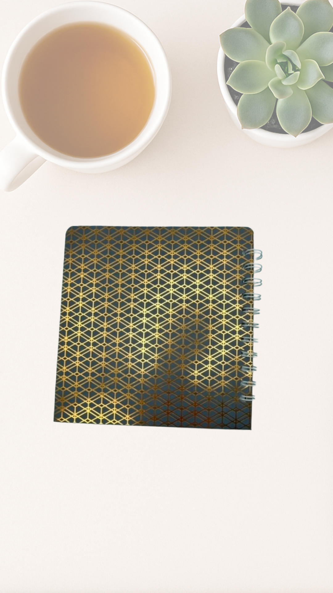 Notebook with gold and blue geometric pattern back cover