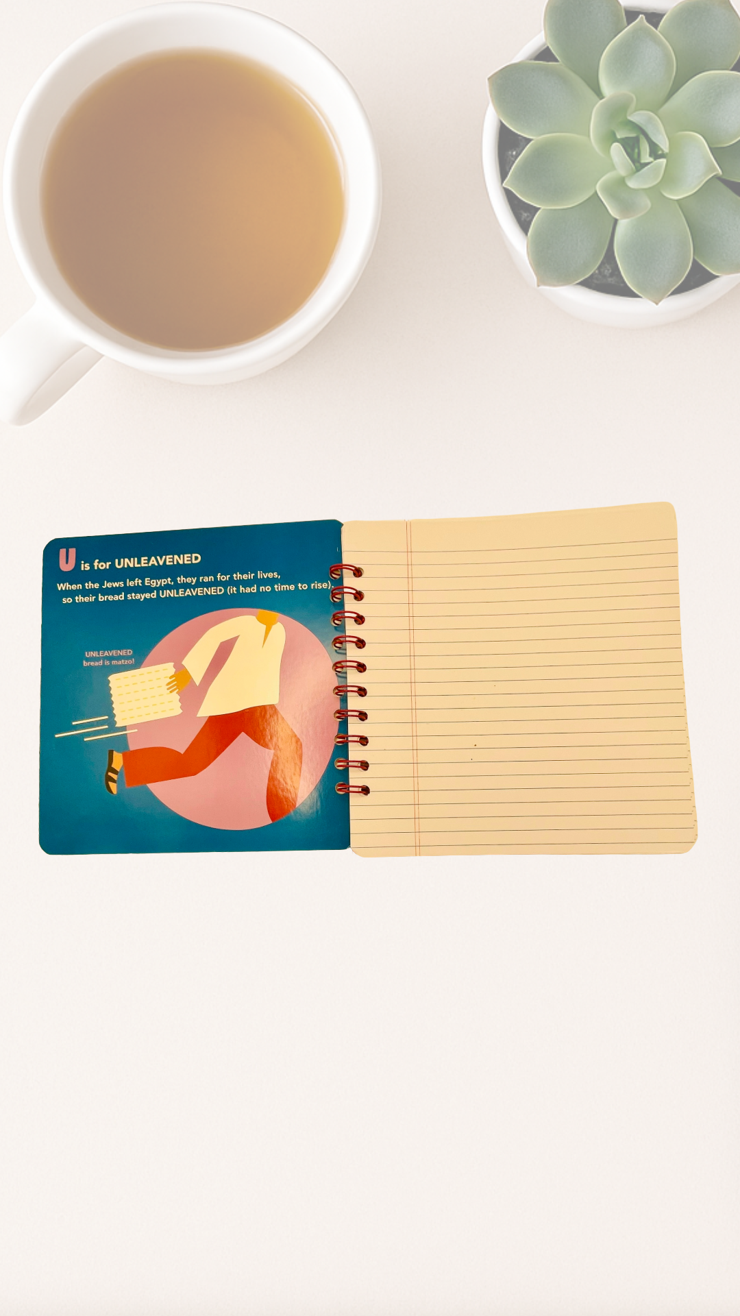 Spiral notebook with a colorful design inside cover that says U is for Unleavened